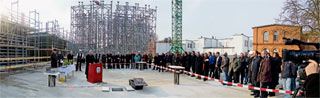 Picture: Guests at the foundation stone ceremony during the speech by Prof. Weber, president of the Bundesarchivs